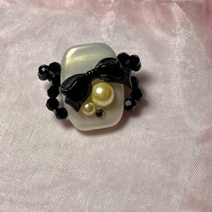 TARINA TARANTINO ring with black bow